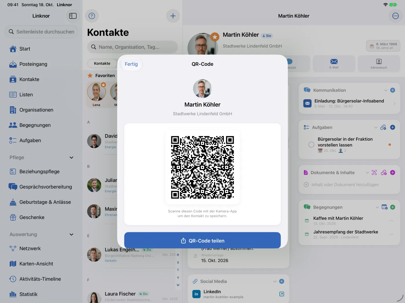 QR-Code mit Kontaktdaten und dem Knopf „QR-Code teilen“